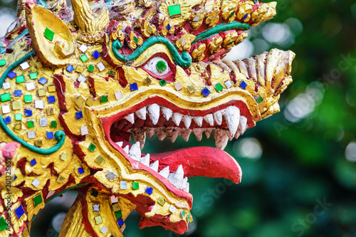 Colorful dragon head sculpture close-up