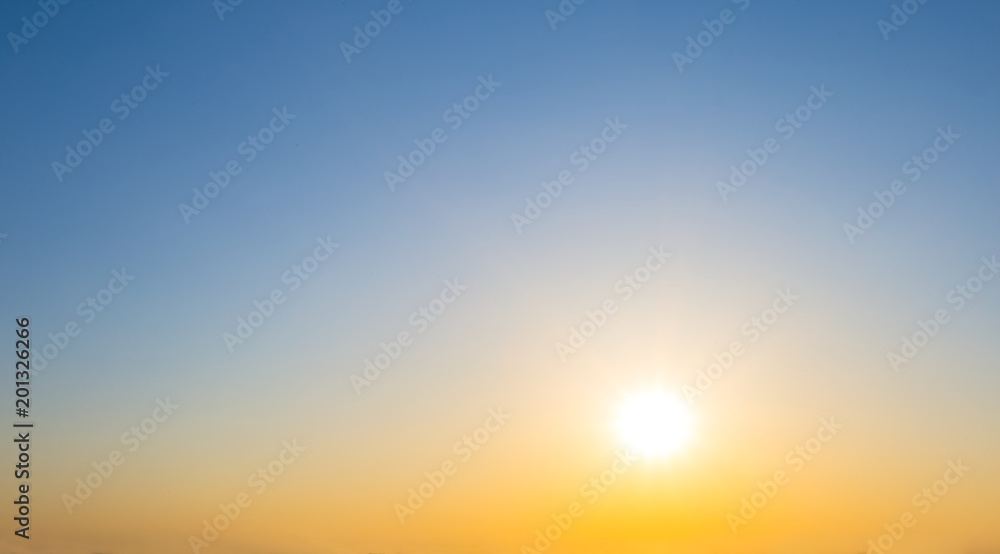 evening low sun on a clear sky background, bright sunset