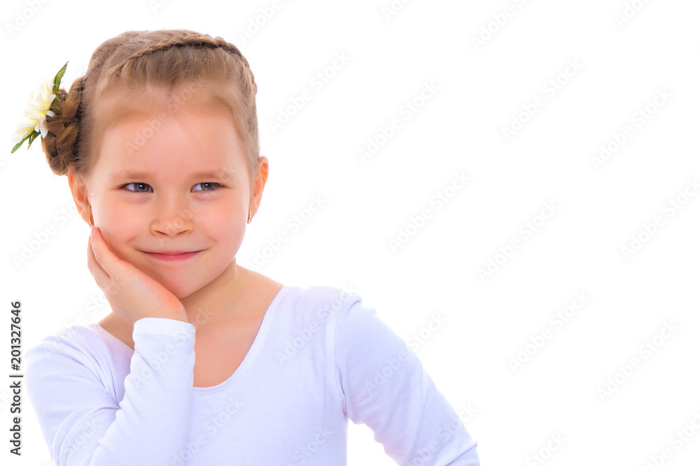 The little girl folded her hands around her face.