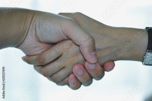 Handshake for friendship concept