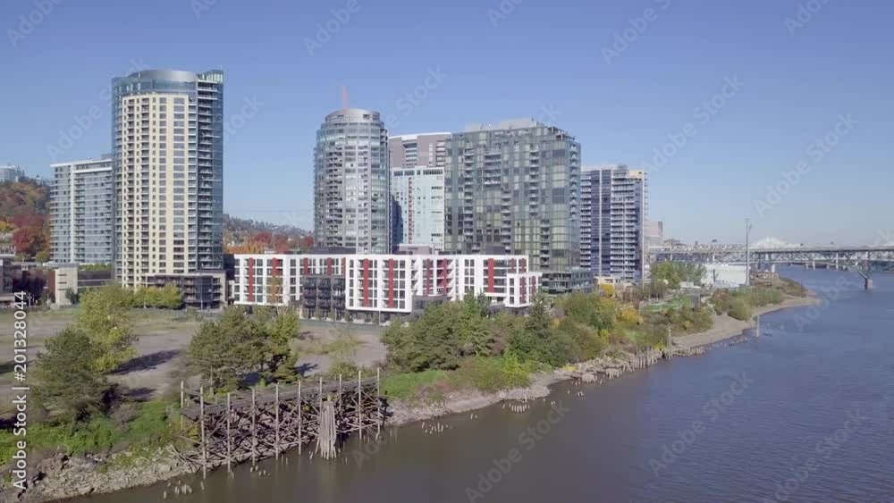 Aerial View Of Highrise Condos In SW Portland, OHSU In Distance, Drone Flys Over Willamette River, Oregon, USA Aerial View Of Highrise Condos In SW Portland, OHSU In Distance, Drone Flys Over Willamette River, Oregon, USA