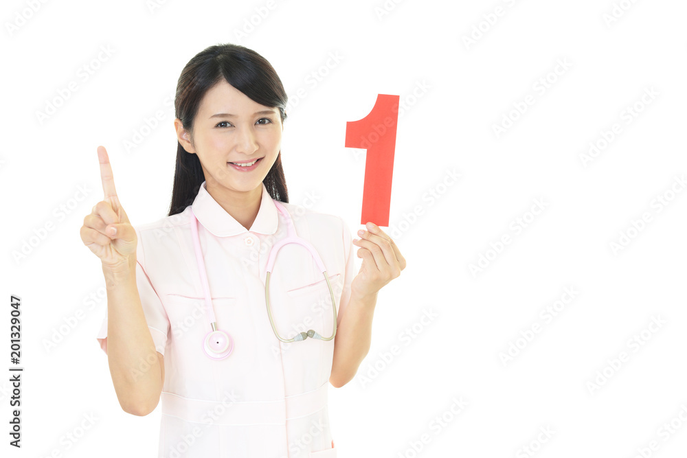 数字の1を持つ看護師 数字の1を持つ看護師