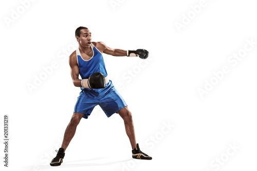 Sporty man during boxing exercise making hit. Photo of boxer on white background © master1305