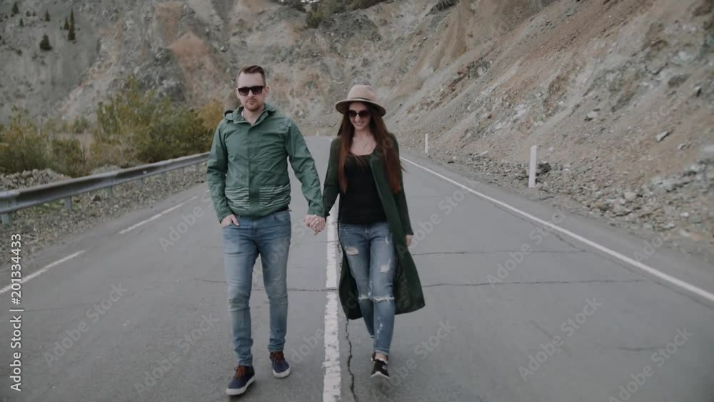 Loving happy and very beautiful couple walking in nature Loving happy and very beautiful couple walking in nature