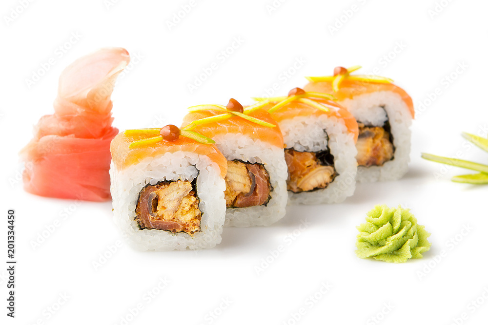 Delicious, appetizing sushi rolls with smoked tuna and tobiko sauce. Isolated. Sushi roll on a white background. Delicious, appetizing sushi rolls with smoked tuna and tobiko sauce. Isolated. Sushi roll on a white background.