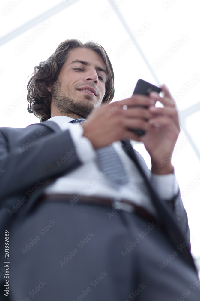 businessman reading text message on smartphone businessman reading text message on smartphone