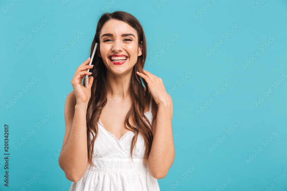 Portrait of a cheerful young girl in summer dress Portrait of a cheerful young girl in summer dress