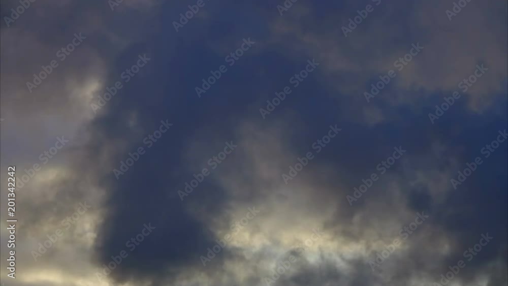 Dark and dramatic storm cloud area background. Time Lapse. Epic storm tropical clouds at sunset. Timelapse 4K UHD. Dark and dramatic storm cloud area background. Time Lapse. Epic storm tropical clouds at sunset. Timelapse 4K UHD.