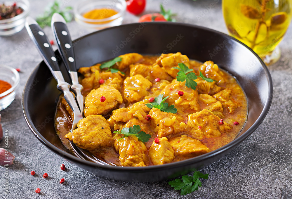 Curry with chicken and onions. Indian food. Asian cuisine. Curry with chicken and onions. Indian food. Asian cuisine.