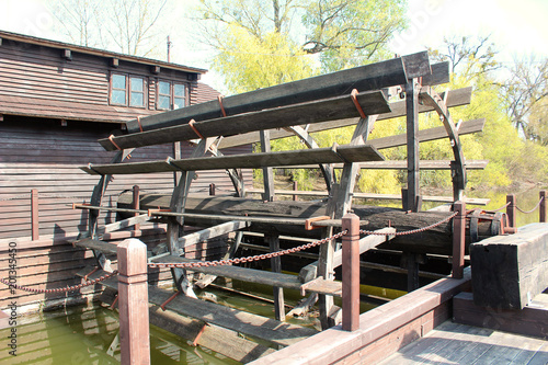 Wooden mill wheel of a floating boat mill at Kolárovo, Slovakia, now technical museum