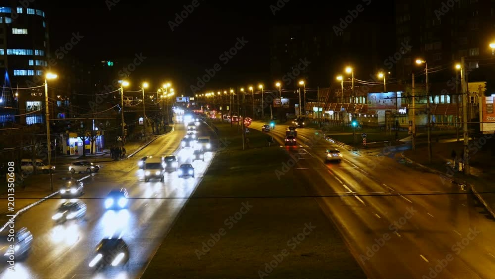 Night traffic in city. Timelapse. Night scenery of highway with transportation traffic in night downtown, time lapse. 4K UHD. Kaliningrad - December 2017 . Night traffic in city. Timelapse. Night scenery of highway with transportation traffic in night downtown, time lapse. 4K UHD. Kaliningrad - December 2017 .