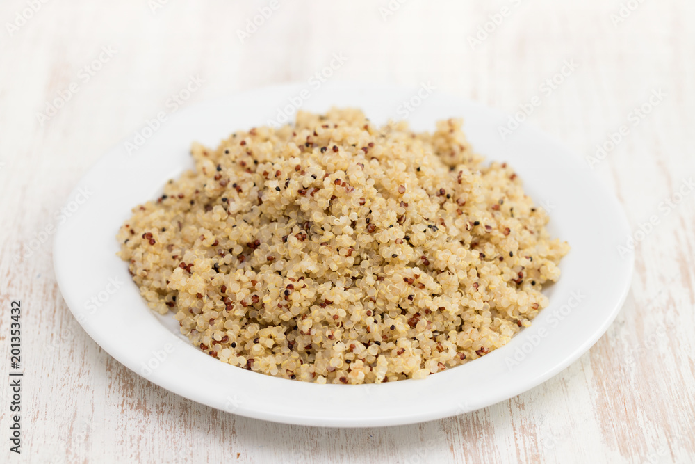 boiled quinoa on white plate boiled quinoa on white plate