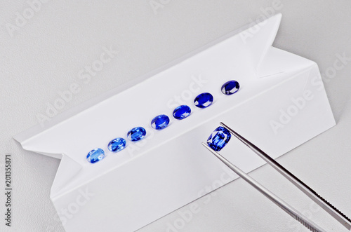 Set of  sapphires with different shades of blue photo