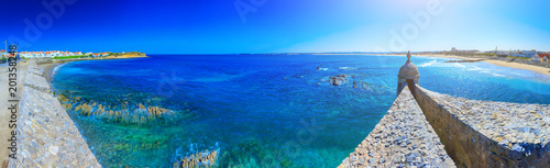 Wonderful romantic afternoon panoramic seascape. Coastline cliffs of the Atlantic ocean in Peniche. Quebrado and Gamboa Beach from medieval fortress. West coast of Portugal at sunny weather.