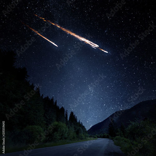 Falling meteorite, asteroid, comet on Earth. Elements of this image furnished by NASA.