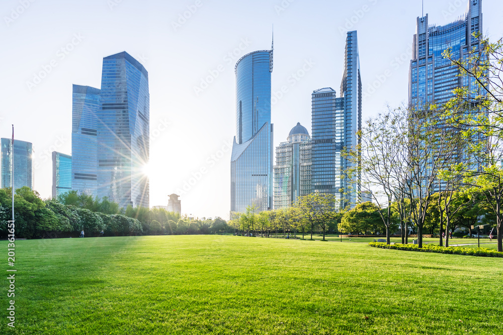 green lawn with modern building in park