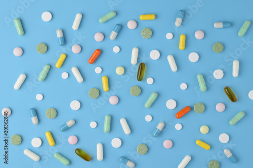 A variety of pharmaceutical ingredients on blue background