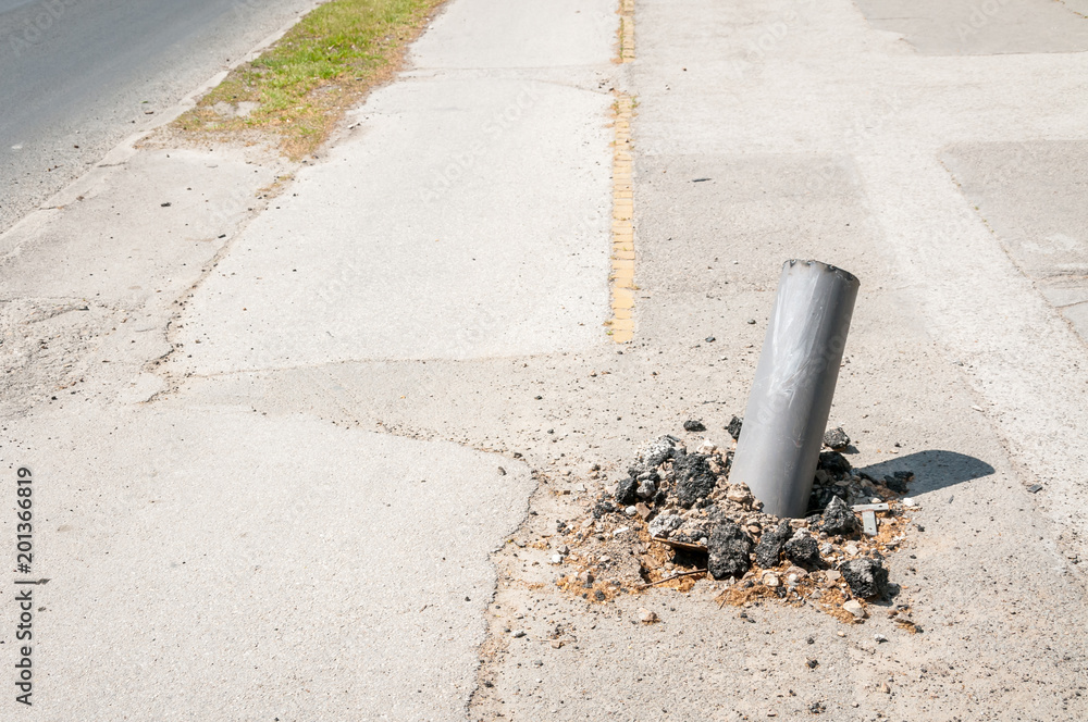 Damaged road traffic barrier metal safety pole hit by fast car in accident  and distorted Stock Photo | Adobe Stock