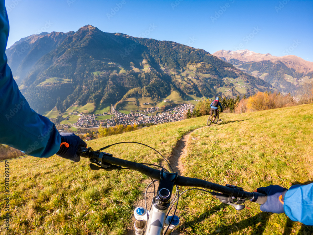 Two men mountain biking in Dolomites, Meran, South Tyrol, Italy Stock Photo  | Adobe Stock