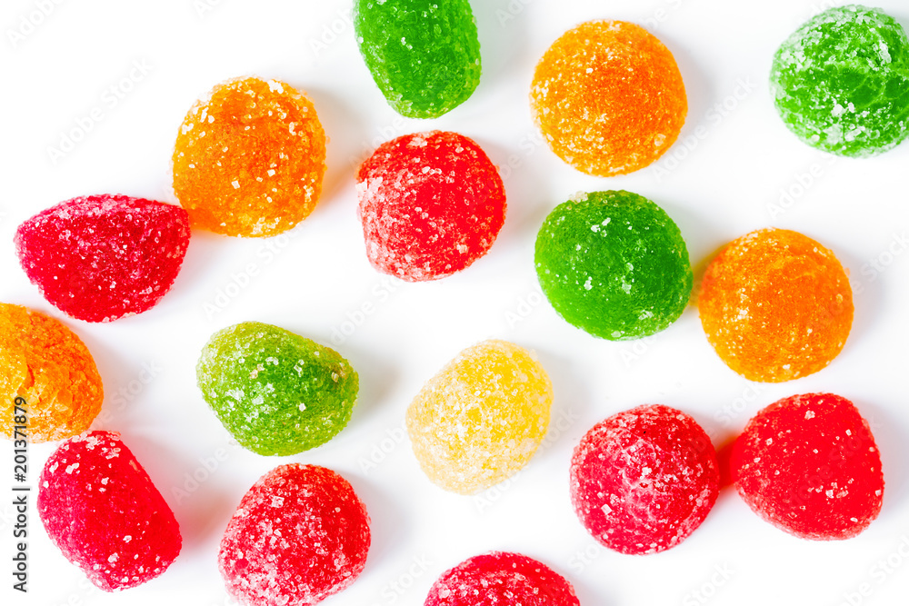 sweets and sugar candies on white background top view sweets and sugar candies on white background top view