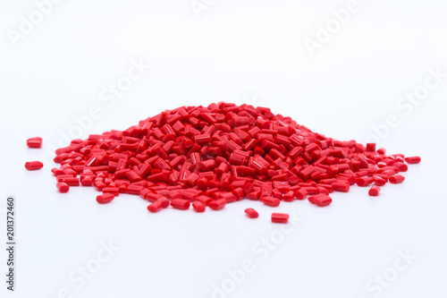 Red plastic polymer granules.