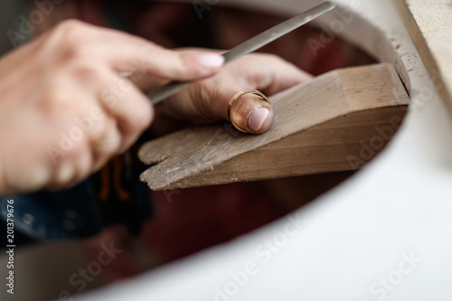 Craft jewelery making. Wedding Ring polishing.