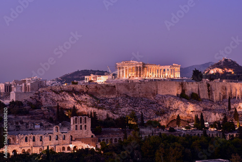 Panoramic Skyline of the capital city of Athens and the famous Acropolis Hill in Greece at dusk