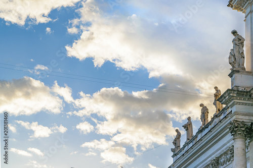 Sculptures at Top of Ancient Building  Rome  Italy