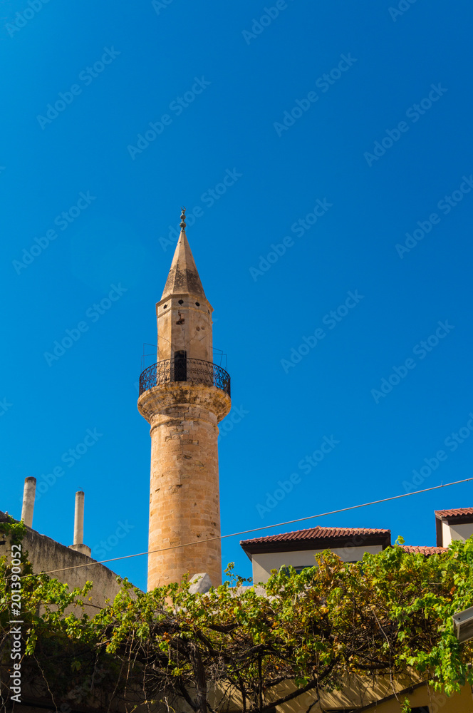 The minaret of Achmet Aga in Chania of Crete, Greece. The mosques in Crete are the remains of the Muslims Ottomans who used to live on the island for many years