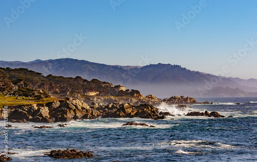 Sunset Point - Pebble Beach, California, February 17, 2018: Beautiful sea and rocky point vista along the 17 Mile Drive south of Cypress Point Golf Course overlooking Sunset Point.