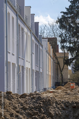 Construction site with almost completed modern row houses in Berlin-Lichtenrade