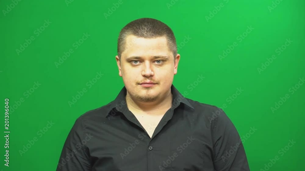 Young man posing. Raises vigorously his hands and exclaim. Young man posing. Raises vigorously his hands and exclaim.