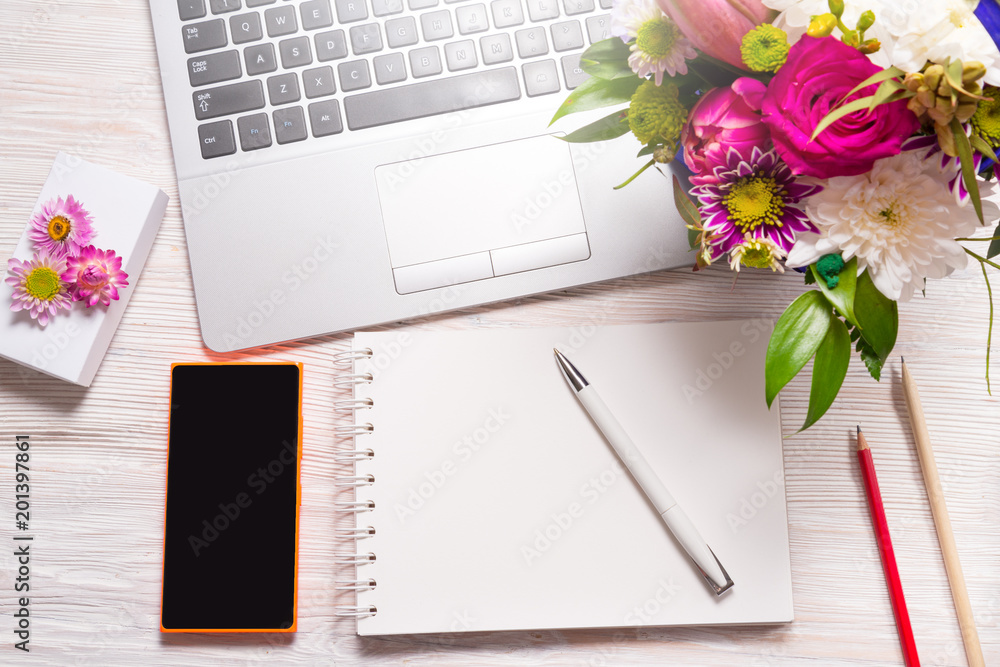 Florist office desk, laptop and smart phone Florist office desk, laptop and smart phone