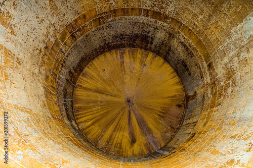 Inside surface of steel rusty structure granary complex