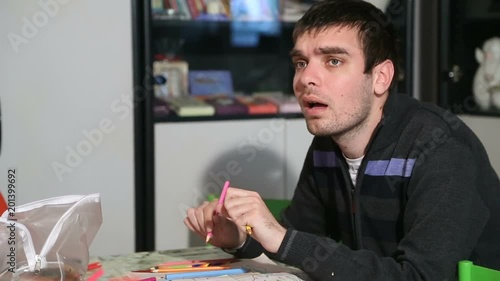 YOUNG MAN WITH AUTISM DRAWING