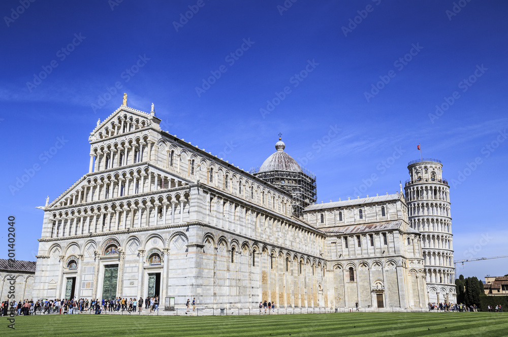 The Pisa Baptistery with the Cathedral and Leaning Tower of Pisa (Tuscany, Italy)