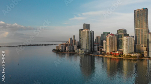 MIAMI - MARCH 31  2018  Brickell Key and Downtown Miami aerial view. The city attracts 20 million tourists annually