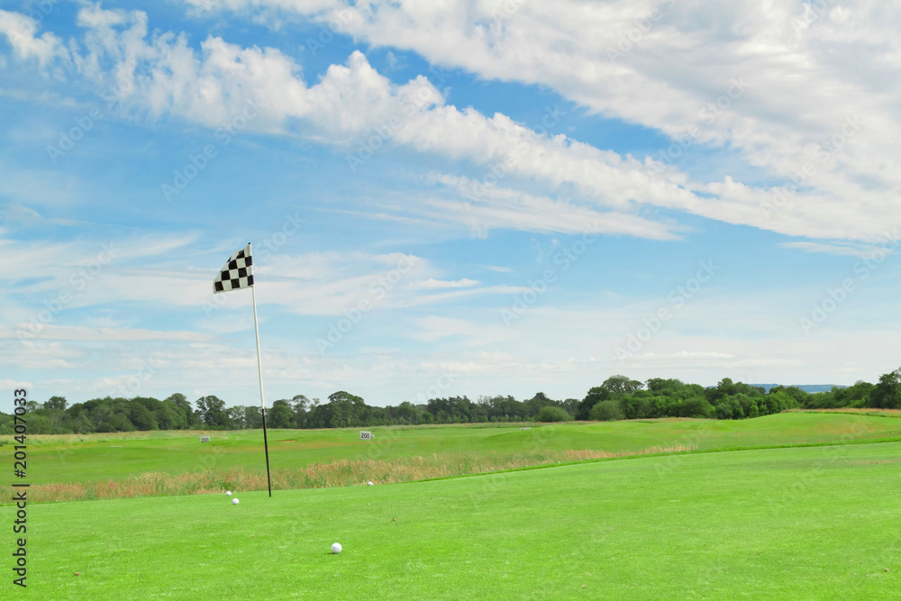 Flag on the irish golf field Flag on the irish golf field