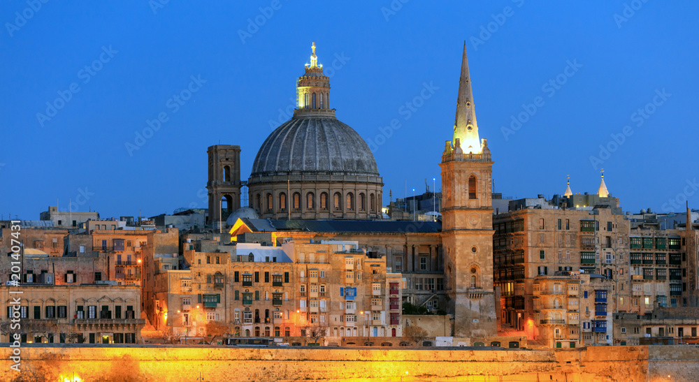 Valletta, Malta, Skyline in the evening with the dome of the Carmelite Church and the tower of St Paul`s