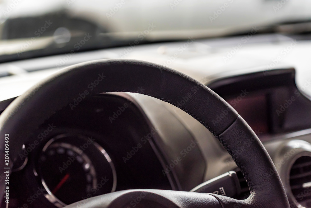 Steering wheel of modern car close
