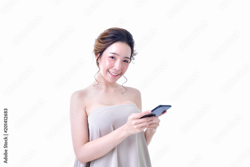 The concept of healthy beautiful woman. Beautiful women keep healthy. Beautiful woman hands holding the mobile phone. Beautiful young woman using finger pointing at mobile phone. The concept of healthy beautiful woman. Beautiful women keep healthy. Beautiful woman hands holding the mobile phone. Beautiful young woman using finger pointing at mobile phone.
