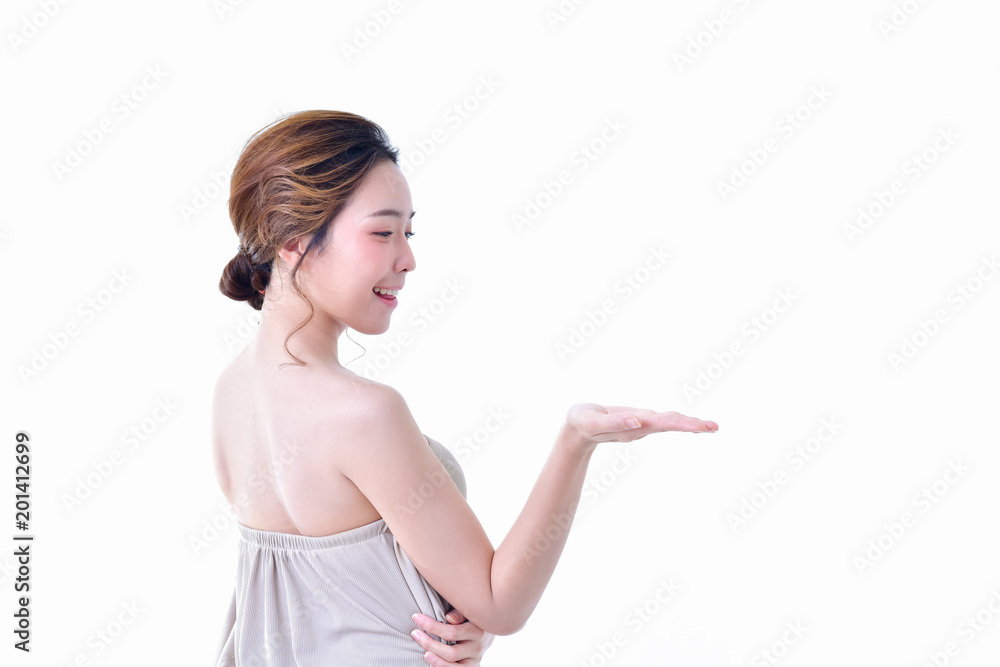 The concept of healthy beautiful woman. Beautiful women keep healthy. Beautiful women are present. Beautiful woman pointing fingers on white background. The concept of healthy beautiful woman. Beautiful women keep healthy. Beautiful women are present. Beautiful woman pointing fingers on white background.