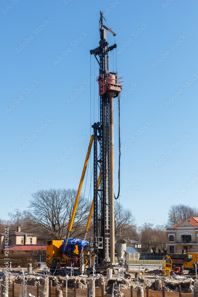 pile bore machine. A pile driver is a mechanical device used to drive piles, poles into soil to provide foundation support for buildings