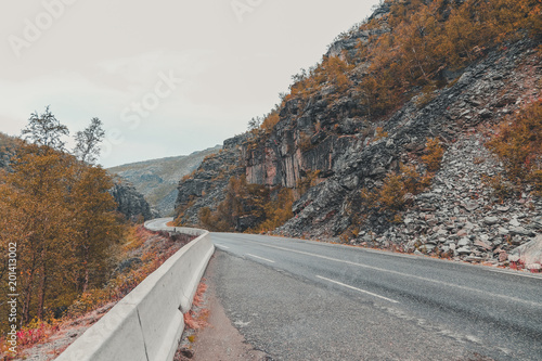 Northern Norway, road in a big ravine on an early autumn day on the road between Alta and Kautokeino photo