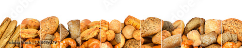 Fresh baked bread products in form vertical lines isolated on white background.