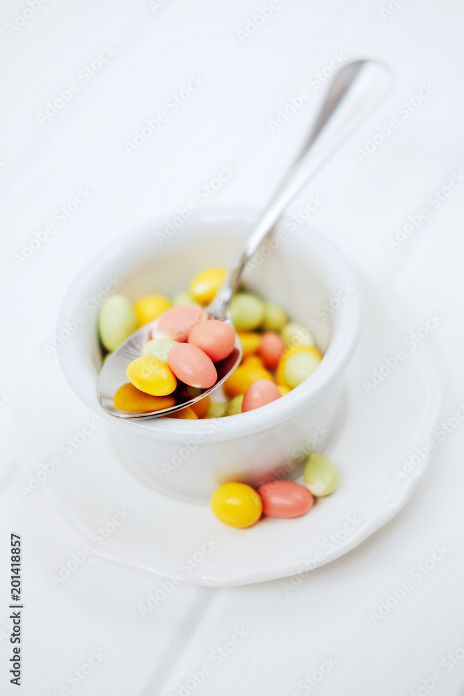 Colorful dragee sprinkles. Peanuts coated with sweet yoghurt. Colorful dragee sprinkles. Peanuts coated with sweet yoghurt.