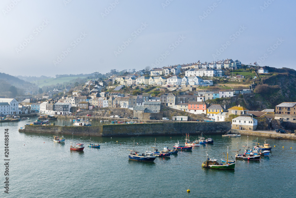 The Cornish village of Mevagissey with a view of the harbour with traditional lobster and crab boats it is a popular destination for tourists and in an area of outstanding natural beauty