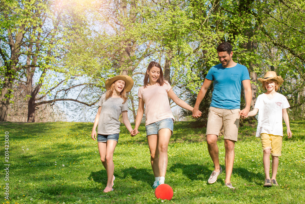 family walking in the park 