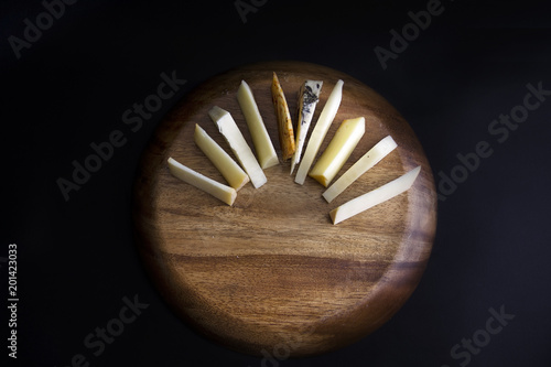 Table decoration of different flavors of cheese