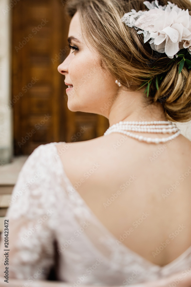 Bride with wedding makeup and hairstyle. Smiling bride. Wedding Bride with wedding makeup and hairstyle. Smiling bride. Wedding